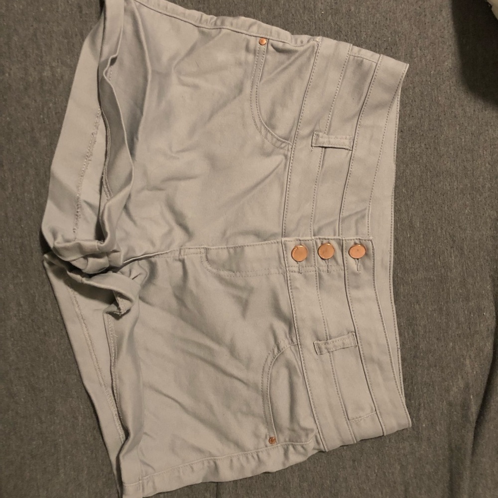 Grey shorts with rose gold buttons